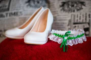 Wedding shoes. Shoes. bride's wedding accessories. photo of bride's shoes on the sofa. Wedding charges