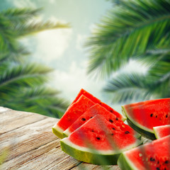 watermeolon and palms leaves 