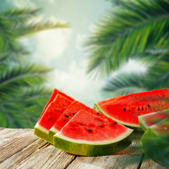 watermeolon and palms leaves 