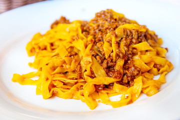 tasty pasta Italian meat sauce pasta on the table