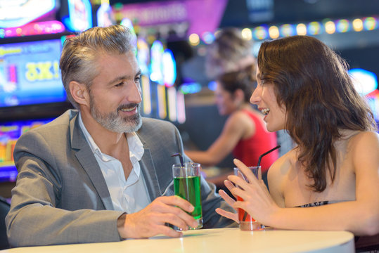 couple having a date in a casino
