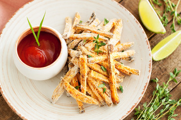 Sweet potato fries with ketchup and thyme