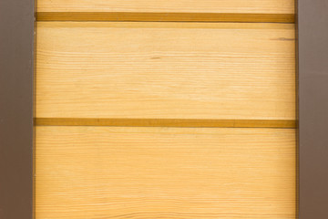 yellow wooden background texture with brown frame and empty space for copy or text