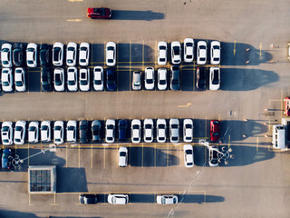 Fototapeta premium Aerial Drone View of Car Park with Empty Parking Lots.