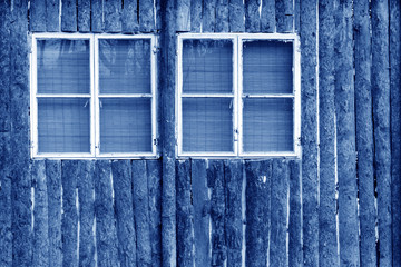 windows on the brown wooden wall