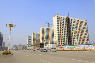 Obraz premium high rise residential buildings and roads in a city
