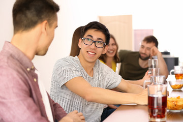 Group of friends drinking beer in bar