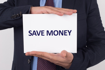 Man showing paper with SAVE MONEY text