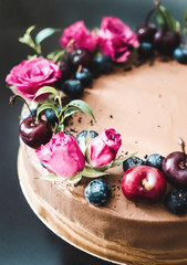 Chocolate cake with berries and flowers - french pastry