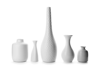 Ceramic vases on white background