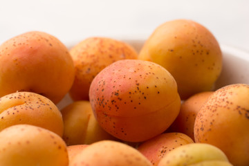 Large juicy apricots Close-up, minimal concept of fashionable food. Summer concept.