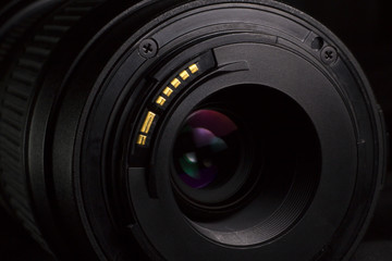 Telephoto lens aperture mount. DSLR lens back.
