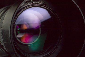 Telephoto lens aperture with nice reflections. Photography vision concept.