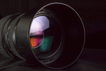 Telephoto lens aperture with nice reflections. Photography vision concept.