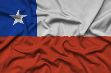 Chile flag is depicted on a sports cloth fabric with many folds. Sport team banner