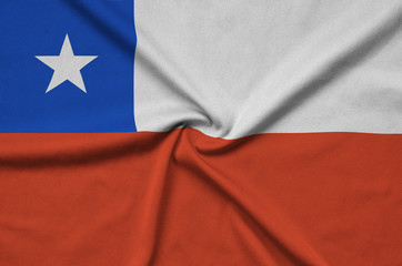 Chile flag is depicted on a sports cloth fabric with many folds. Sport team banner