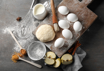 Fototapeta na wymiar Utensils with ingredients for preparing bakery on table