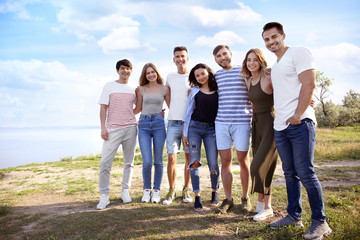 Group of attractive young people outdoors