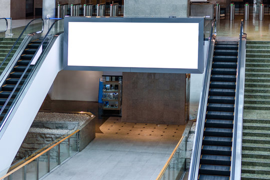 Blank Billboard Or Mock Up Between The Escalator In Department Store