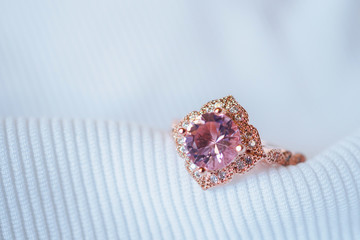 Jewelry luxury pink gold sapphire gemstone ring background