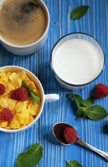 Healthy eating, food and diet concept - Cornflakes with berries