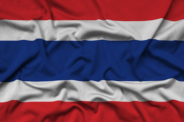 Thailand flag  is depicted on a sports cloth fabric with many folds. Sport team banner