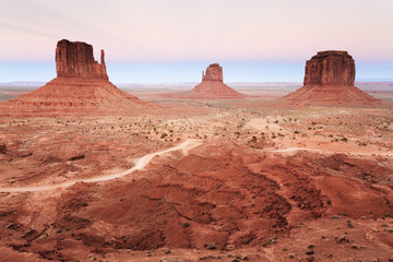 Monument Valley Mittens glowing at sunset