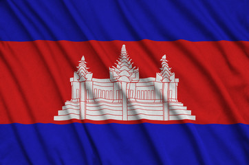 Cambodia flag  is depicted on a sports cloth fabric with many folds. Sport team banner