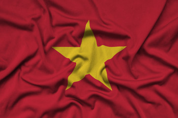 Vietnam flag  is depicted on a sports cloth fabric with many folds. Sport team banner