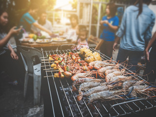 BBQ Party happy summer family dinner at home outdoor vintage style.