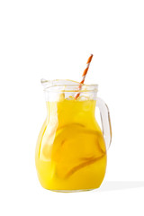 decanter carafe of summer lemonade orange and lemon on white isolate