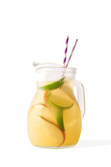 decanter carafe of summer lemonade lemon pear on white isolate