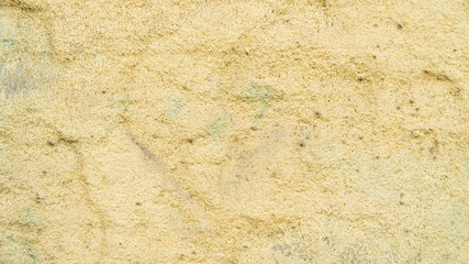 Background old yellow wall close-up.