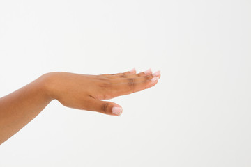 black Woman's hand with palm down. handbreadth isolated on a white background. Front view. Mock up. Copy space. Template. Blank.