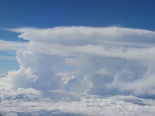 tall clouds from plane