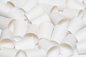 Empty white paper cups on a white background(mockup)