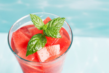 Cocktail of watermelon with a mint leaf, close-up.
