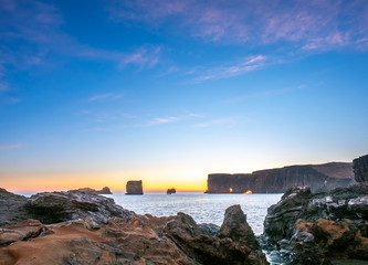 Dyrholaey arch with hole in evening of Iceland
