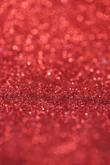 Red bokeh background of glitter lights