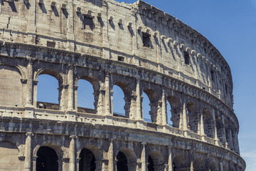 Naklejka premium View of the Colosseum in Rome, Italy. The Colosseum is one of the most popular tourist attractions in Rome