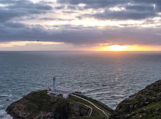 Fototapeta na wymiar Dramatic sky above the historic South Stack Lighthouse - Isle of Anglesey North wales UK