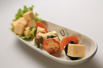 Cheese pieces set with different additional food elements