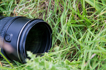 Nature photography equipment outdoors on grass field
