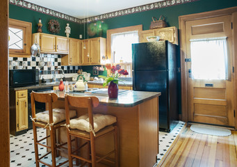 Black & White Theme in Green Victorian Kitchen 