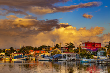 Belize. Sunset on San Pedro Town, Ambergris Caye Island - obrazy, fototapety, plakaty