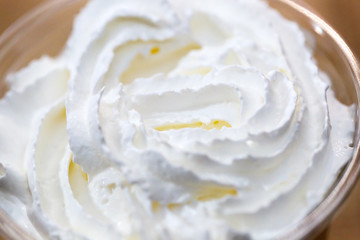 Whipped cream in milkshake. Cold dessert.