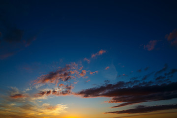 Fototapeta na wymiar Bright clouds in the twilight sky.