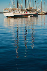 Wooden Boats Reflections Vertical