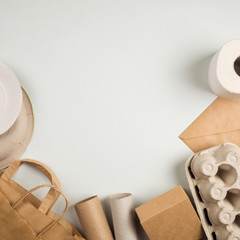 products made from recycled paper: disposable tableware, package, box, cardboard, egg packaging, envelope, toilet paper. concept: environmental protection, nature conservation, recycle