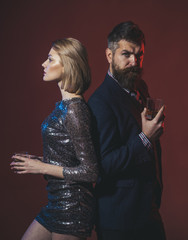 Top party drinking games. Man in suit and fancy lady at corporate party drinking. Celebration with alcohol concept. Man with beard and woman in dress office workers celebrating holiday